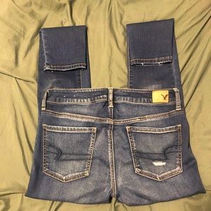 AE DARK DISTRESSED SHORT JEGGING